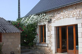 sarthe-farm-house-french-rentals-the-kitchen-french-windows-onto-the-large-terrace-2129370.jpg